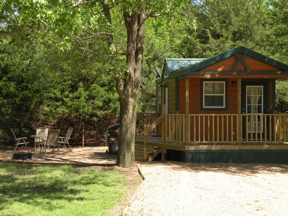 Deluxe cabin with propane grill and fire pit.